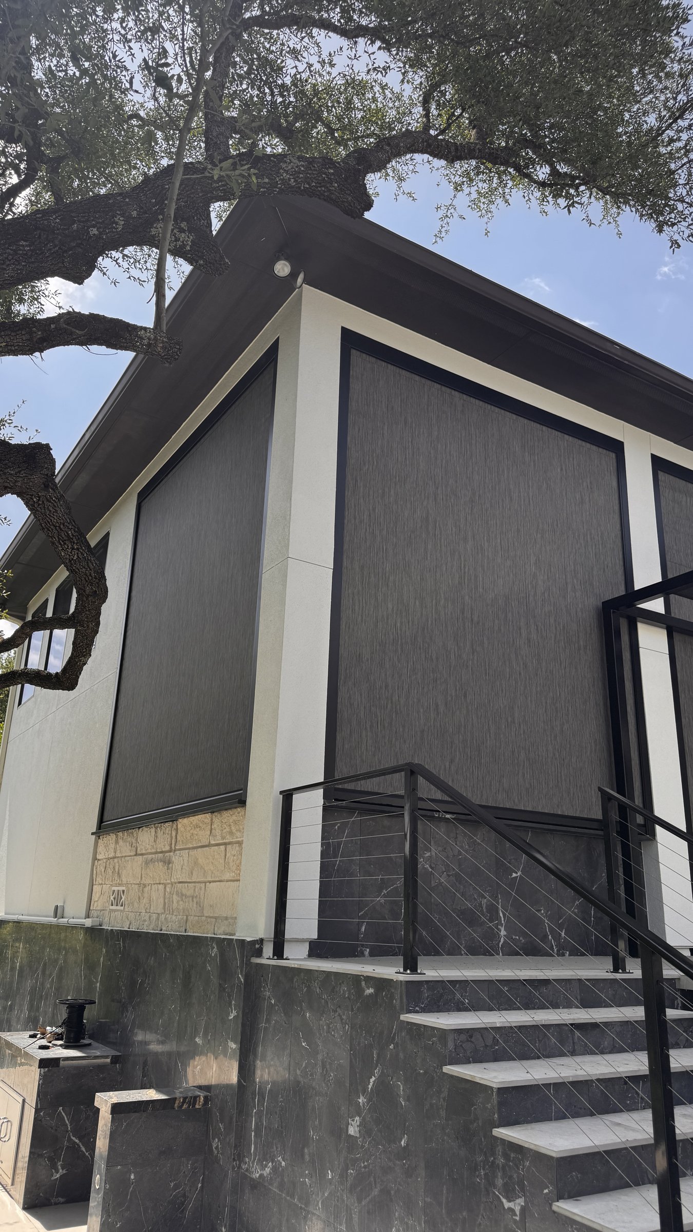 Graphite solar screen on a modern-architecture facade