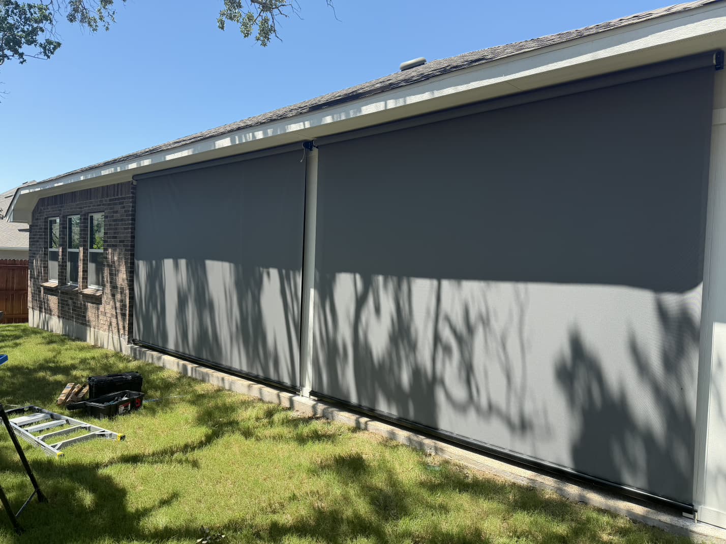 Gray solar screen on a facade