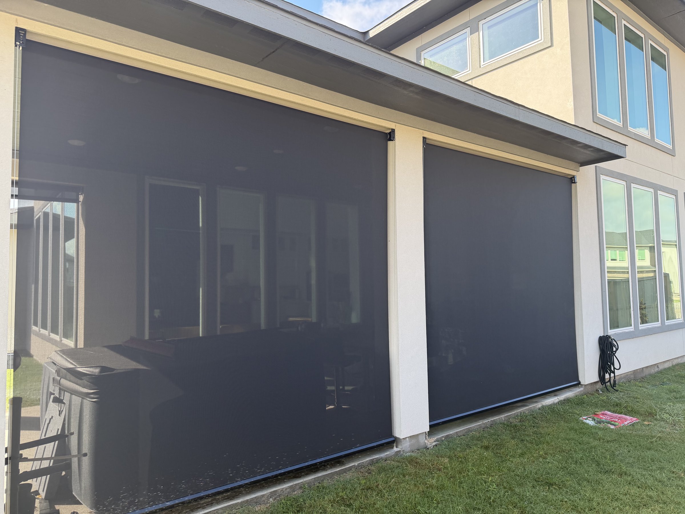 Solar screen on a modern two-story facade