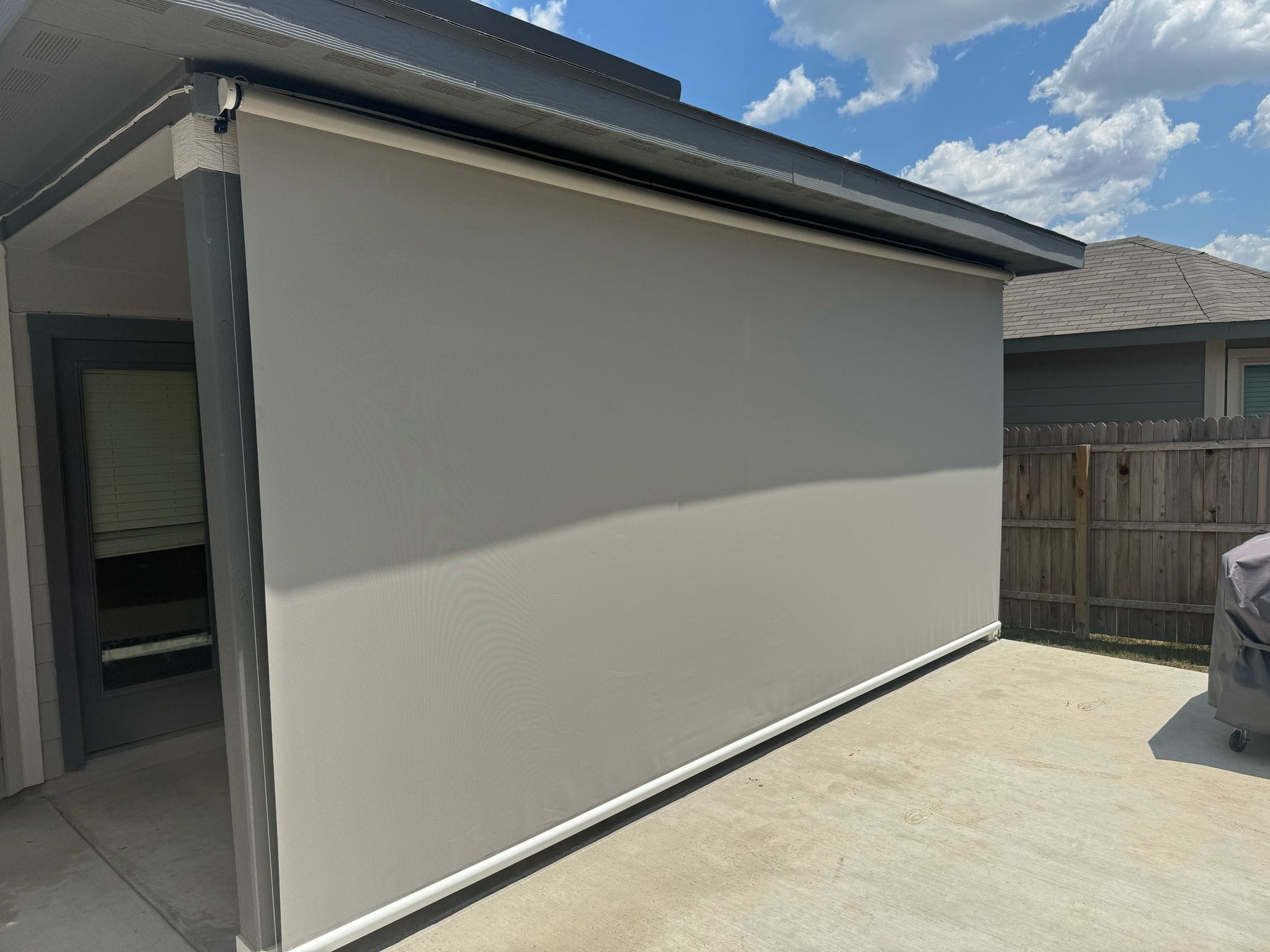 Light gray solar screen on a terrace