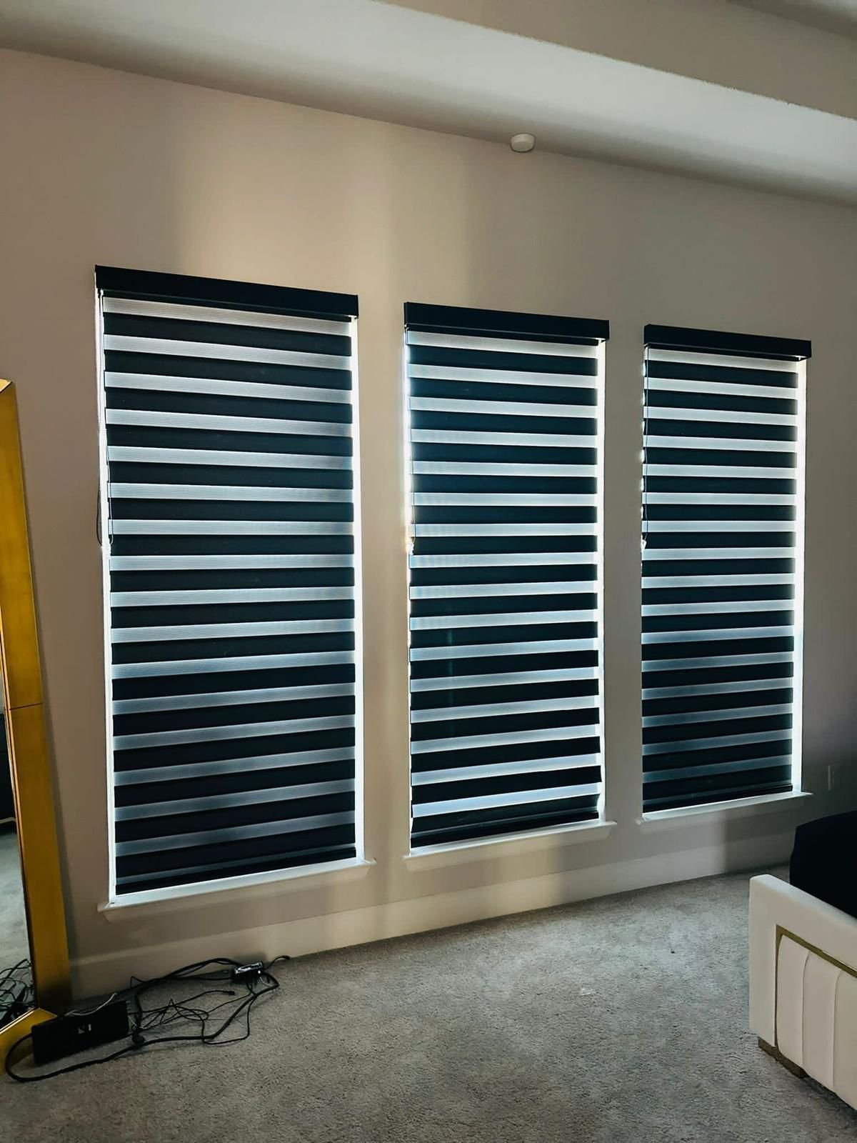 Navy zebra shade in a bedroom