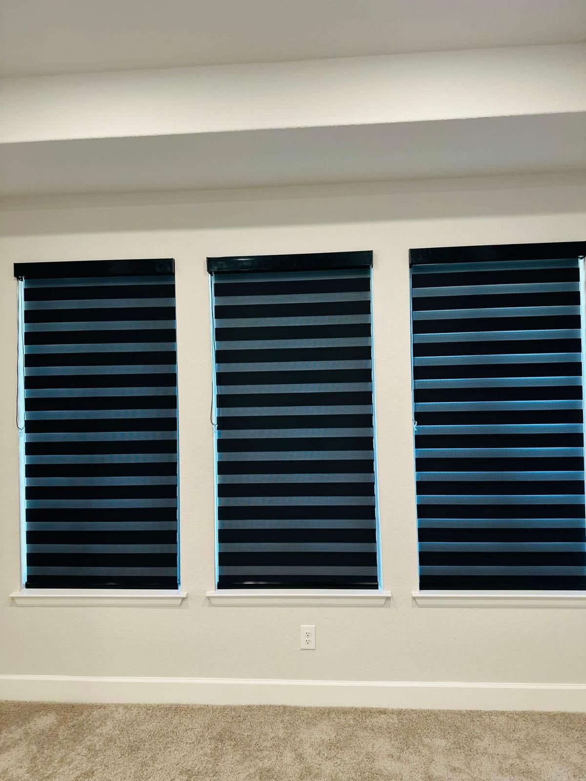 Navy zebra shade in a bedroom
