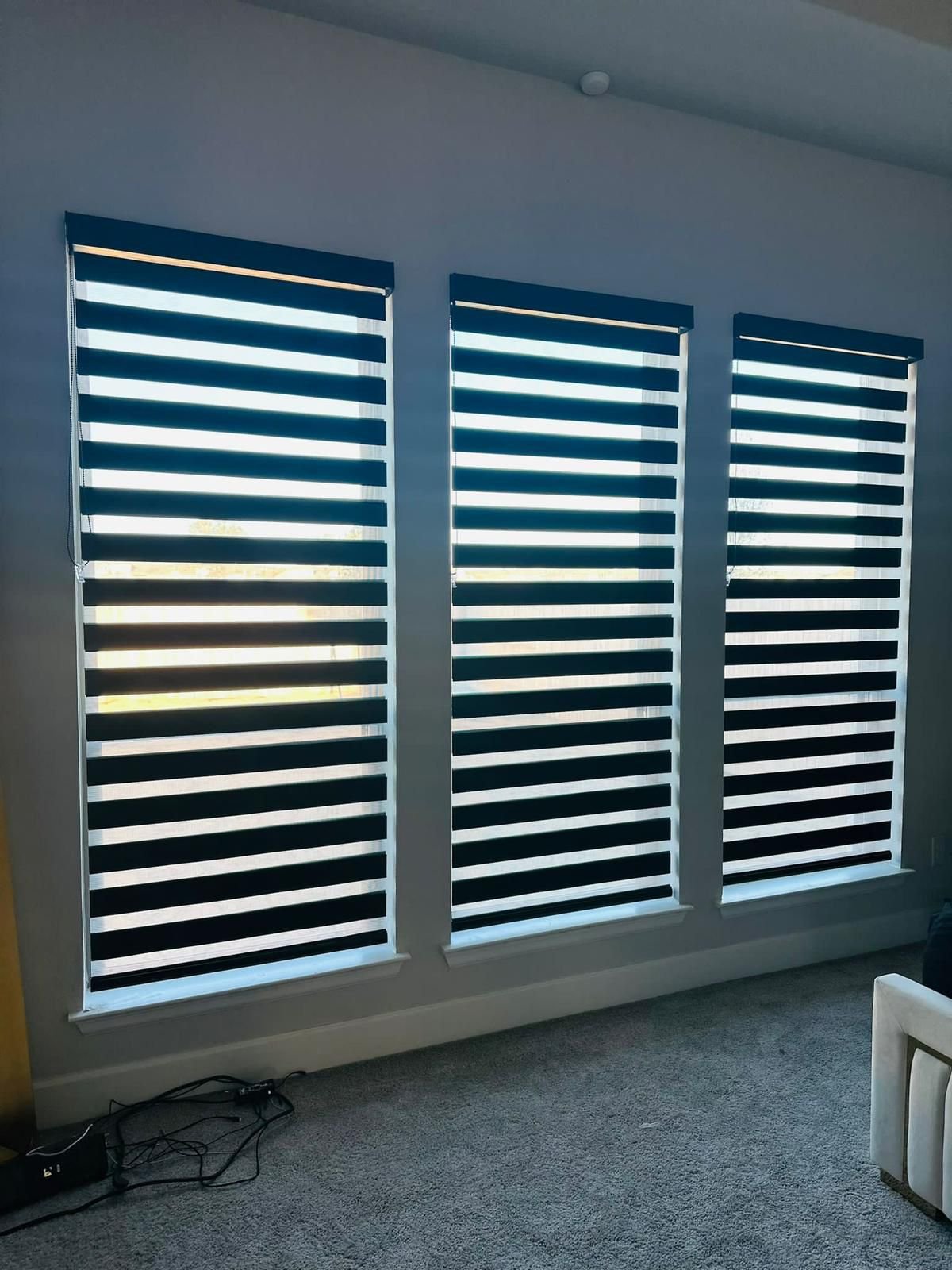 Navy zebra shade in a bedroom